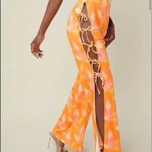 Abstract print self-tie cutout slit pants